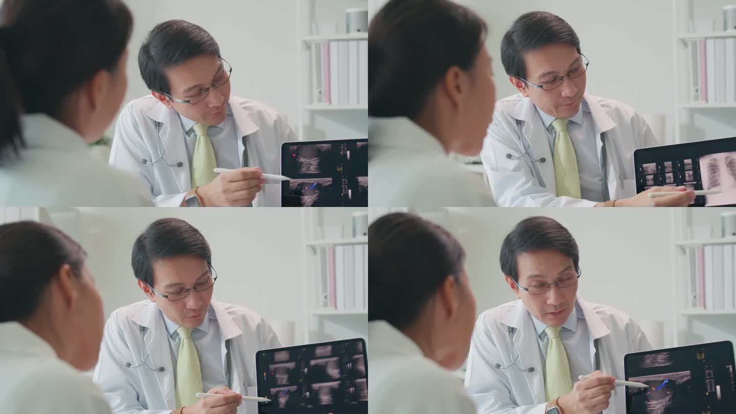 成年亚洲男医生用片剂向住院的女病人展示肺部x线检查结果。医疗保健。
