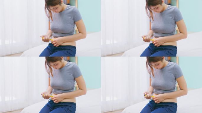 女性注射促排卵剂打排卵针特写视频素材