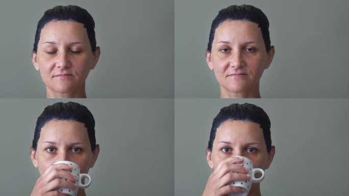 女性在染发过程中用黑色染发剂的画像