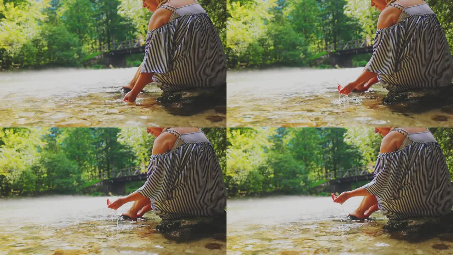 度假时在河里玩水的女人