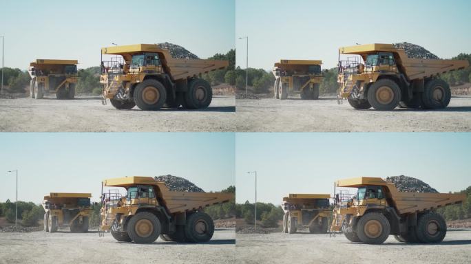 在黄金矿区驾驶重型自卸车采矿设备的操作员，慢镜头