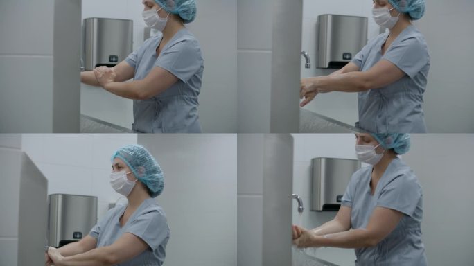 女护士在手术前用肥皂洗手