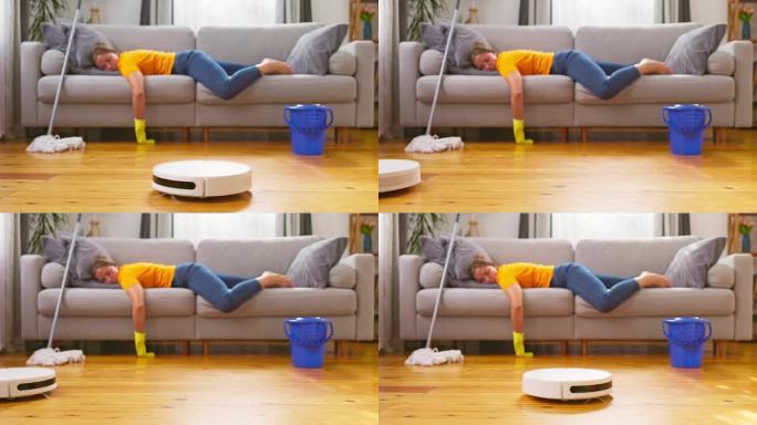 厌倦了没完没了的清洁，一位女士躺在舒适的沙发上，让机器人吸尘器来打扫。创新的清洁技术