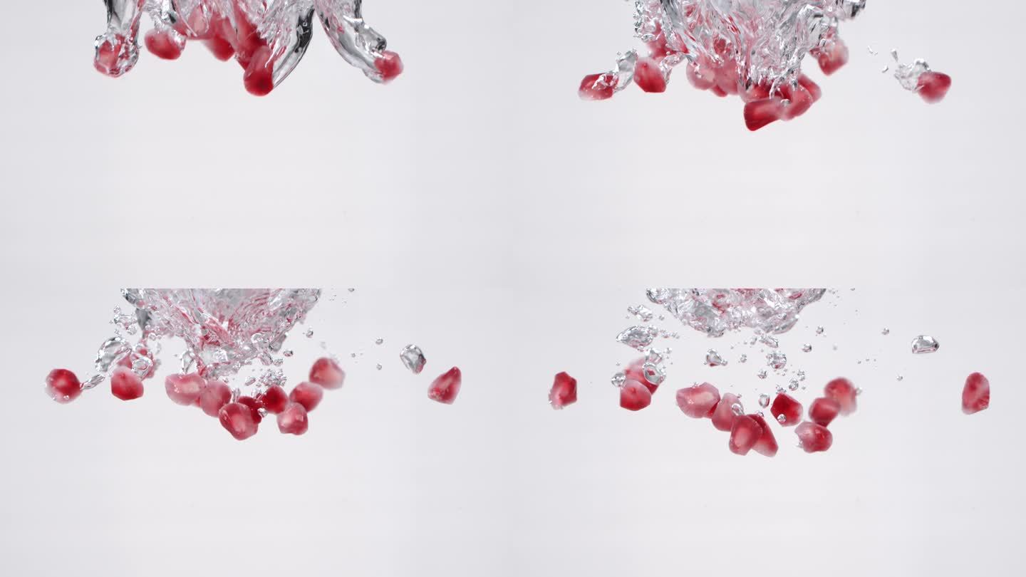 红色石榴籽撒入水中 超高速4k 慢镜头
