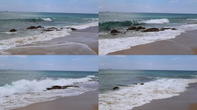 【慢动作】海浪拍打在沙滩礁石上