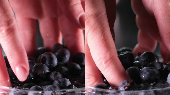 丰富的抗氧化剂，所以美味的水滴在成熟的甜蓝莓。新鲜的蓝莓背景与复制空间为您的文字。素食主义者和素食主