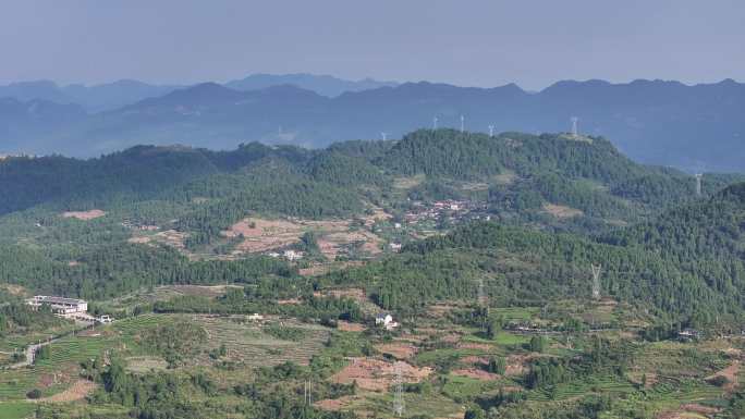 4K-Log-群山环抱山村高压电网铁塔