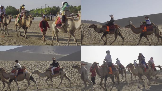 敦煌月牙泉鸣沙山游客骑骆驼