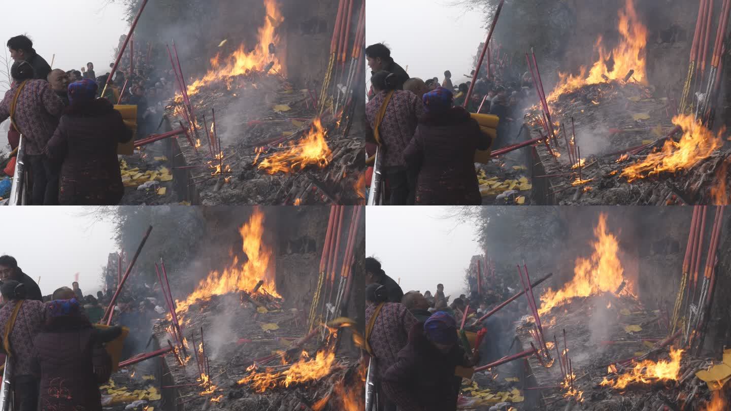 春节期间乡村寺庙烧香拜佛的人群烧高香