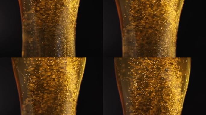 黄色透明液体与泡沫和泡沫在玻璃高脚杯4k电影
