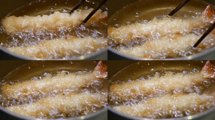 用食用油煎冻虾的视频。
