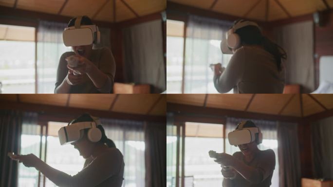 在家的女人戴着虚拟现实耳机，手持游戏射击枪控制器