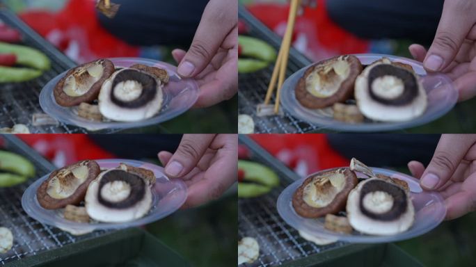 烧烤架上筷子夹烤香菇慢动作