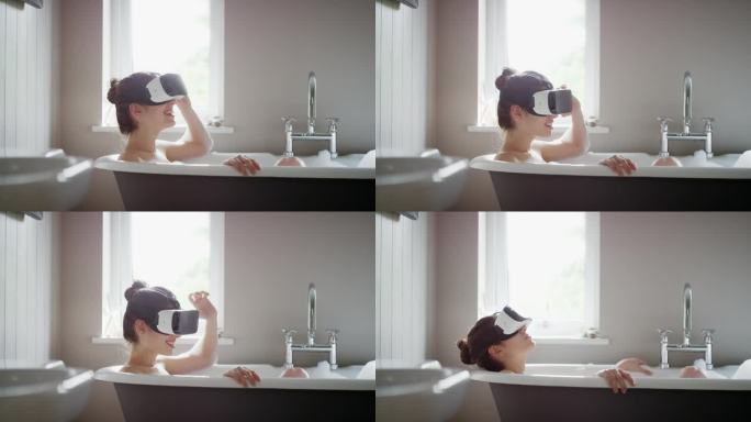 性感的年轻女子戴着虚拟现实耳机，在泡泡浴浴缸放松，观看360度沉浸式概念正念生活方式视频
