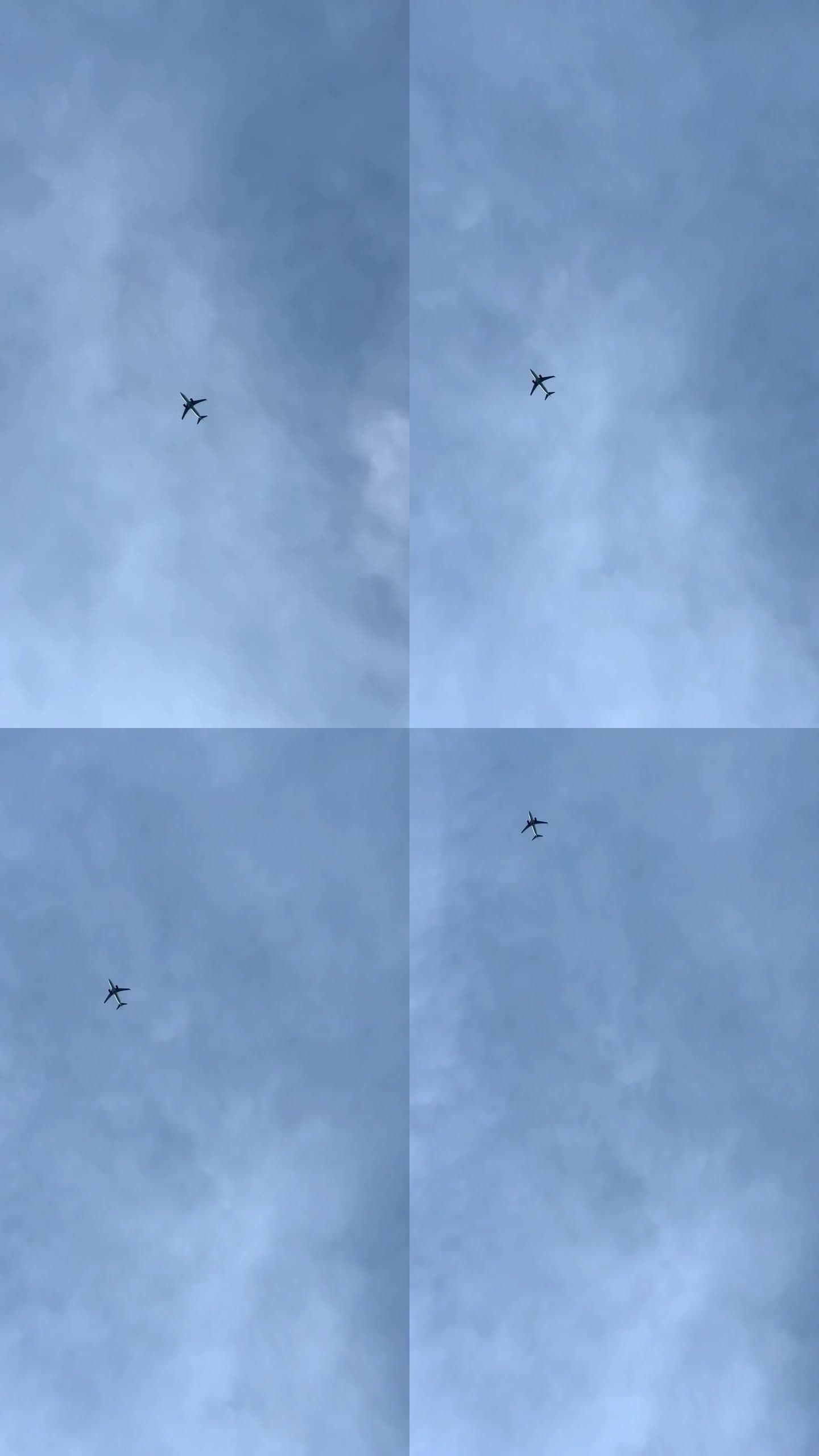 小飞机在蓝天中飞行的跟踪镜头