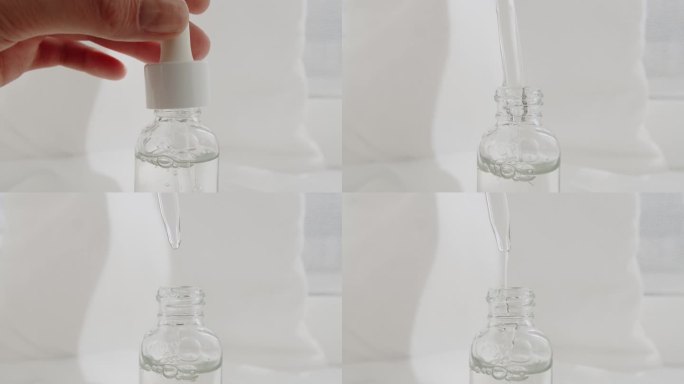 透明的瓶子与护肤霜，精华液在白色的背景。
