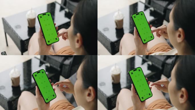 女性在家使用智能手机绿屏