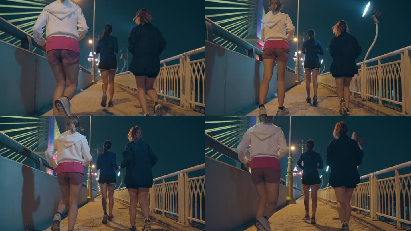 多种族团队年轻的亚洲运动女性穿着运动服，晚上在城市街道上的桥上跑步，享受有氧运动。参加跑步俱乐部和户