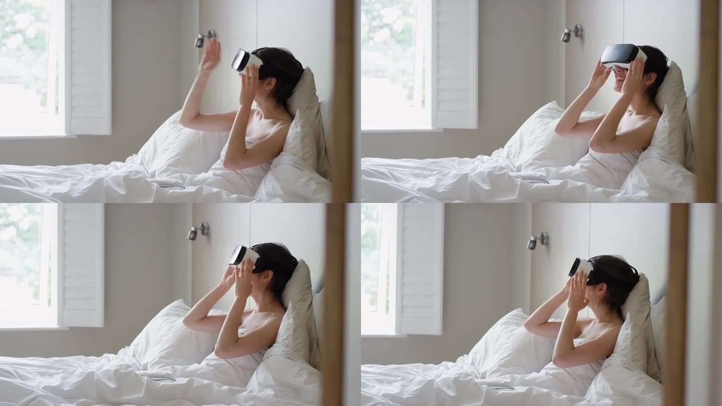 女人在卧室里戴着虚拟现实耳机躺在床上观看360度的想象概念视频