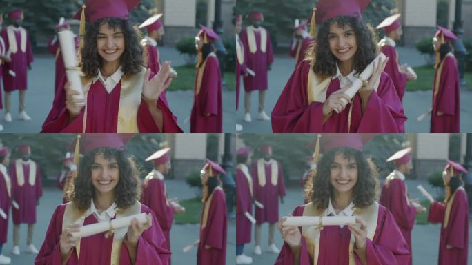 在大学附近的户外，戴着毕业帽、穿着毕业袍、拿着毕业证书的兴奋的年轻女士的肖像，表达着幸福