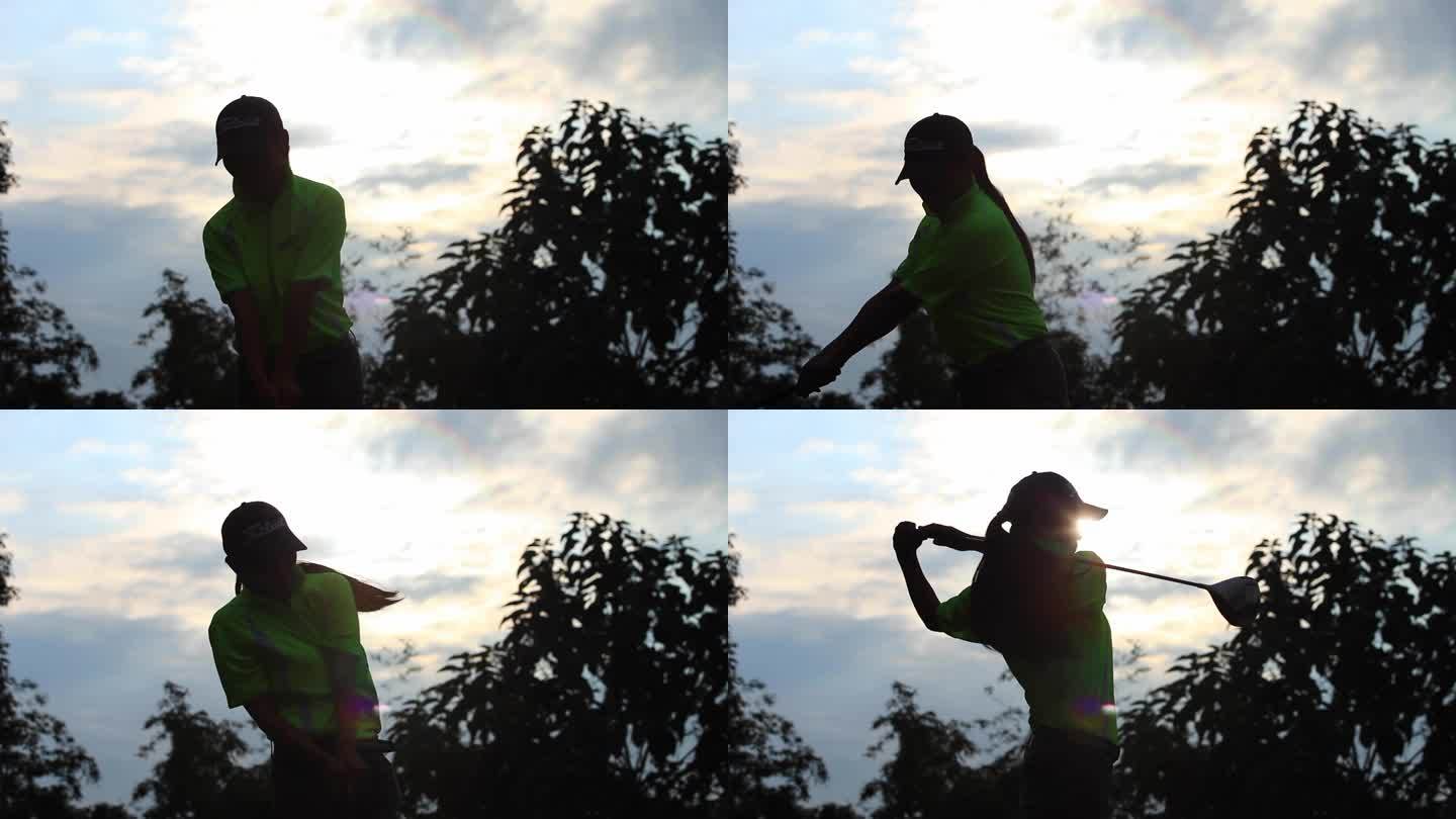 男子背对夕阳打高尔球剪影