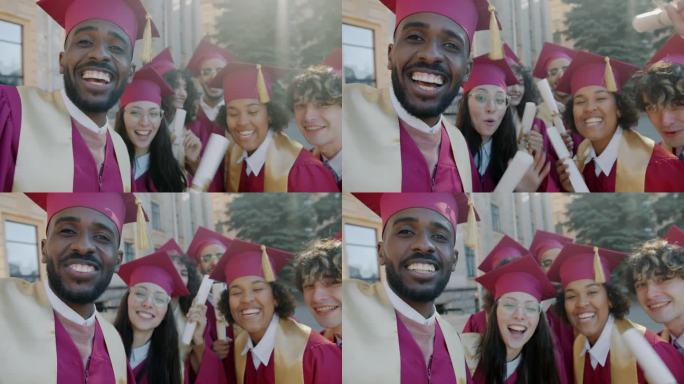男男女女戴着毕业帽，穿着毕业服，在网上视频通话，看着展示文凭的摄像机
