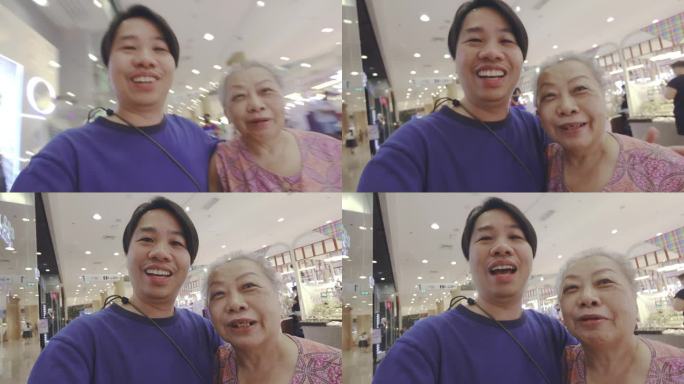 母亲和儿子在购物中心