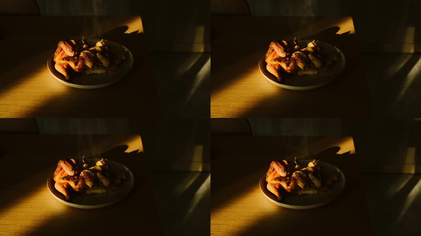 烤鸡在木桌上冒着热气。金黄的烤鸡翅皮配蔬菜。美味的自制食物，电影般的场景