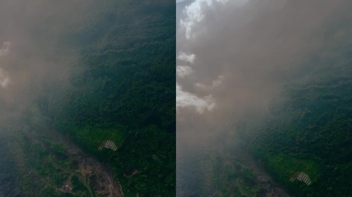 垂直视频。喷发火山柱灰烟活火山峰火山口4k