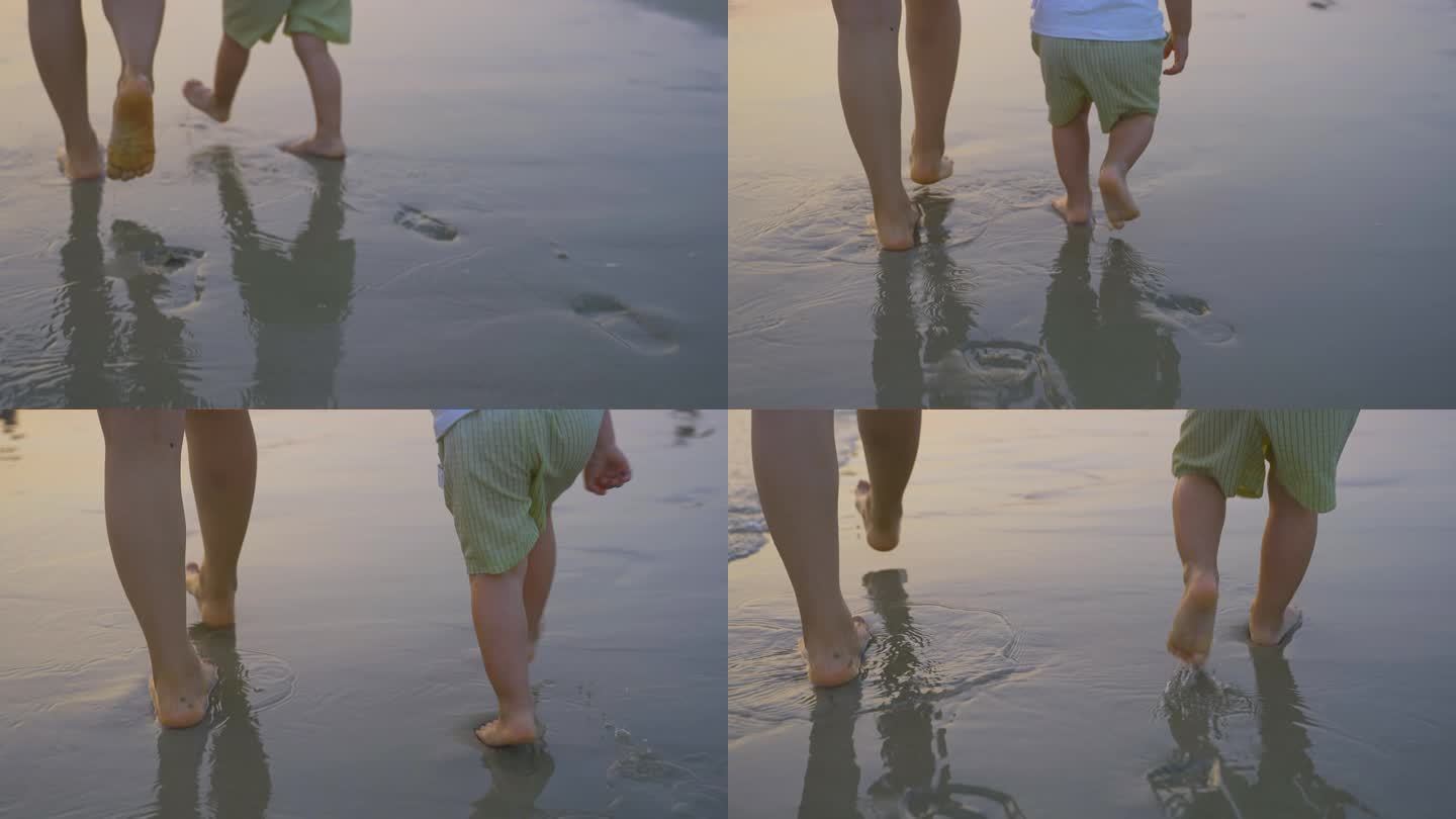 意境唯美母子光脚踩在沙滩上-沙滩上的脚印