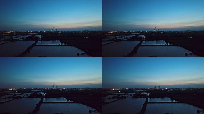 傍晚工业工厂烟囱湖面剪影