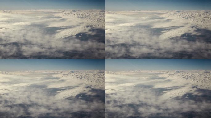 从宇宙飞船上鸟瞰地球。日落时分，从绕地球运行的宇宙飞船上俯视云层，阳光照在地球的云层上，呈现出电影般