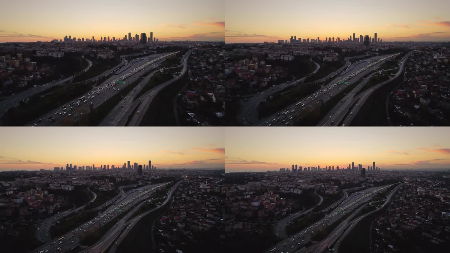 黄昏时分城市天际线和交通的鸟瞰图
