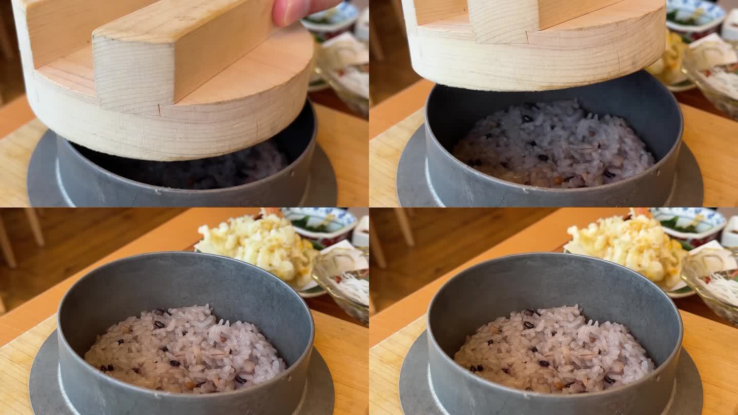 日本龟石的视频。用传统的锅煮的米饭。