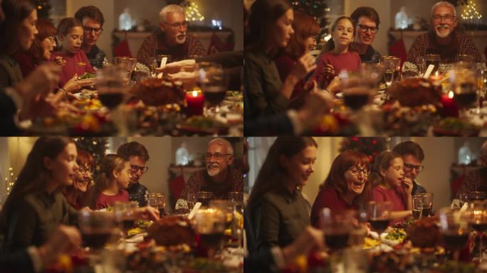 一群不同的亲戚和朋友坐在餐桌后面，享用美味的饭菜和节日的装饰。老人讲有趣的故事，营造愉快的节日气氛