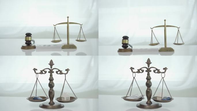 黄铜天平孤立在白底，天平的正义，法律的概念。4 k的视频