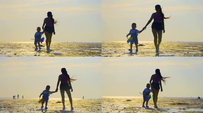 母子海边散步-母子情大手牵小手妈妈与儿子