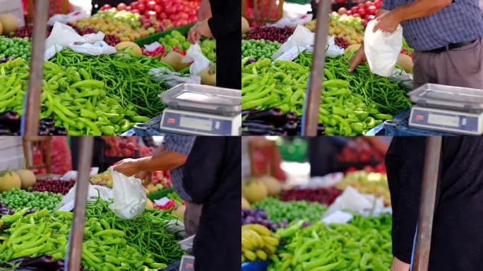 人们在集市上买蔬菜