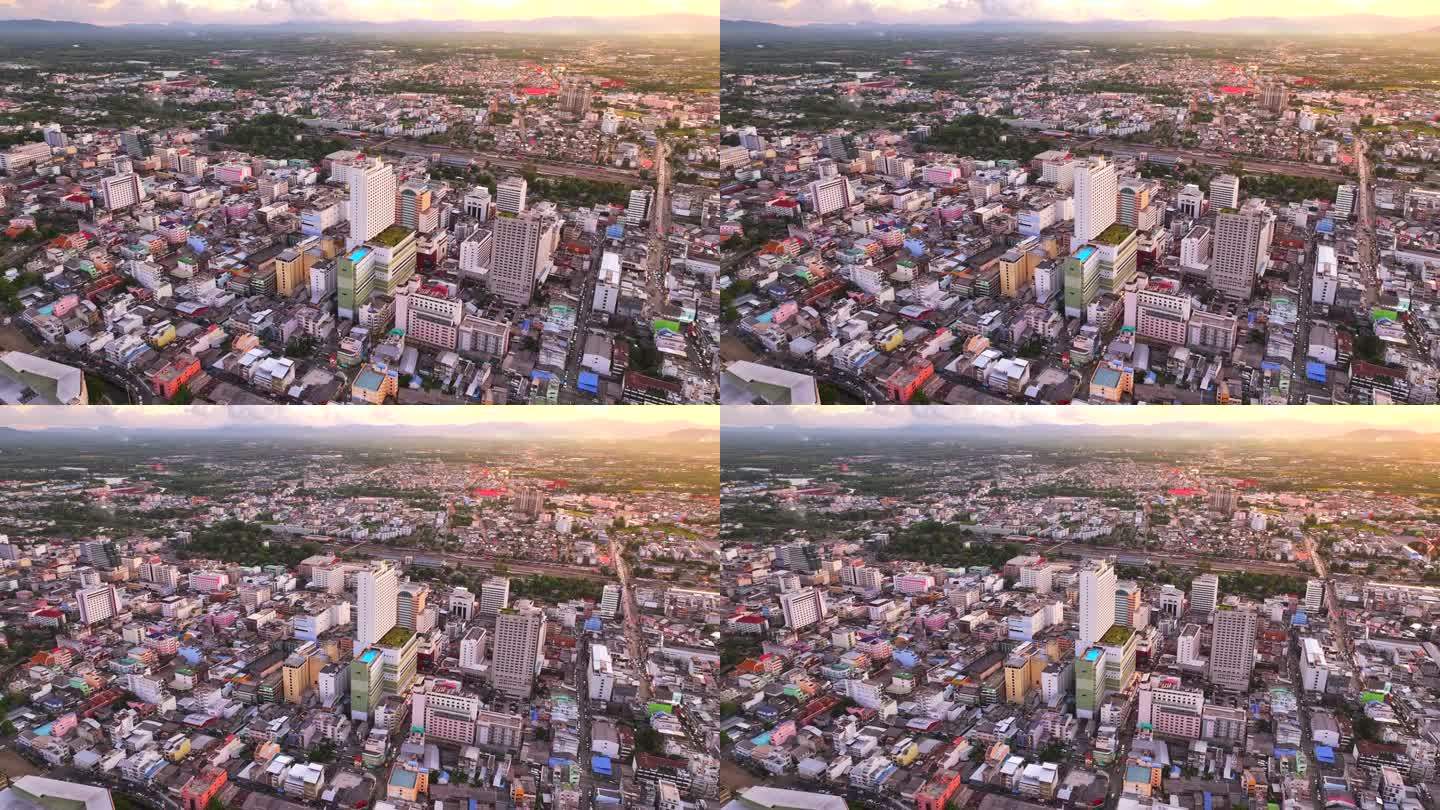 空中拍摄的日落场景，泰国南部宋卡省哈泰伊市中心的核心建筑，金融区的摩天大楼和办公楼