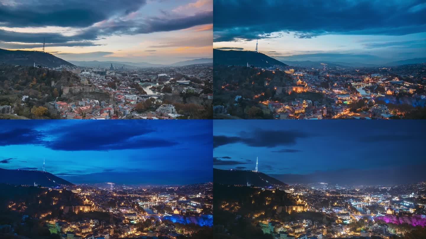 第比利斯,格鲁吉亚。夜景中著名地标的俯视图。格鲁吉亚首都天际线城市景观。日落和夜间灯光下的城市。昼夜