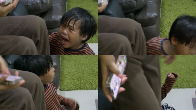 母亲和哭泣的男孩后悔地哭泣。