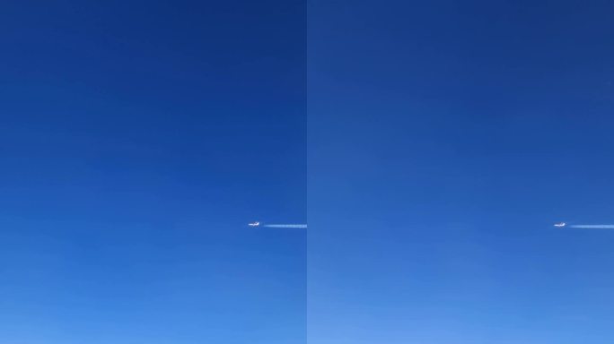 从高海拔的飞机窗口看另一架飞机。