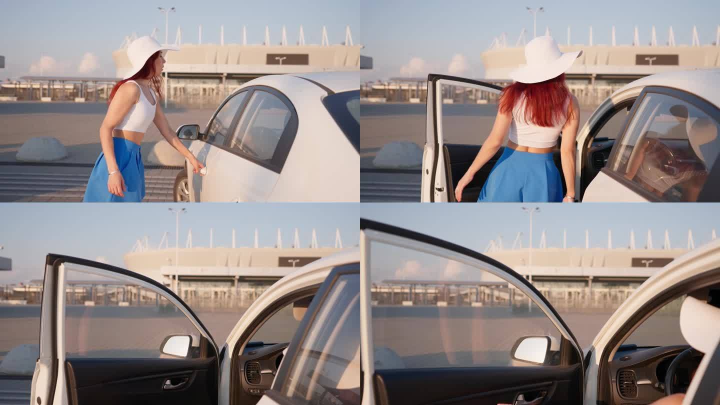 美腿窈窕的魅惑女子坐在一辆白色轿车里行走
