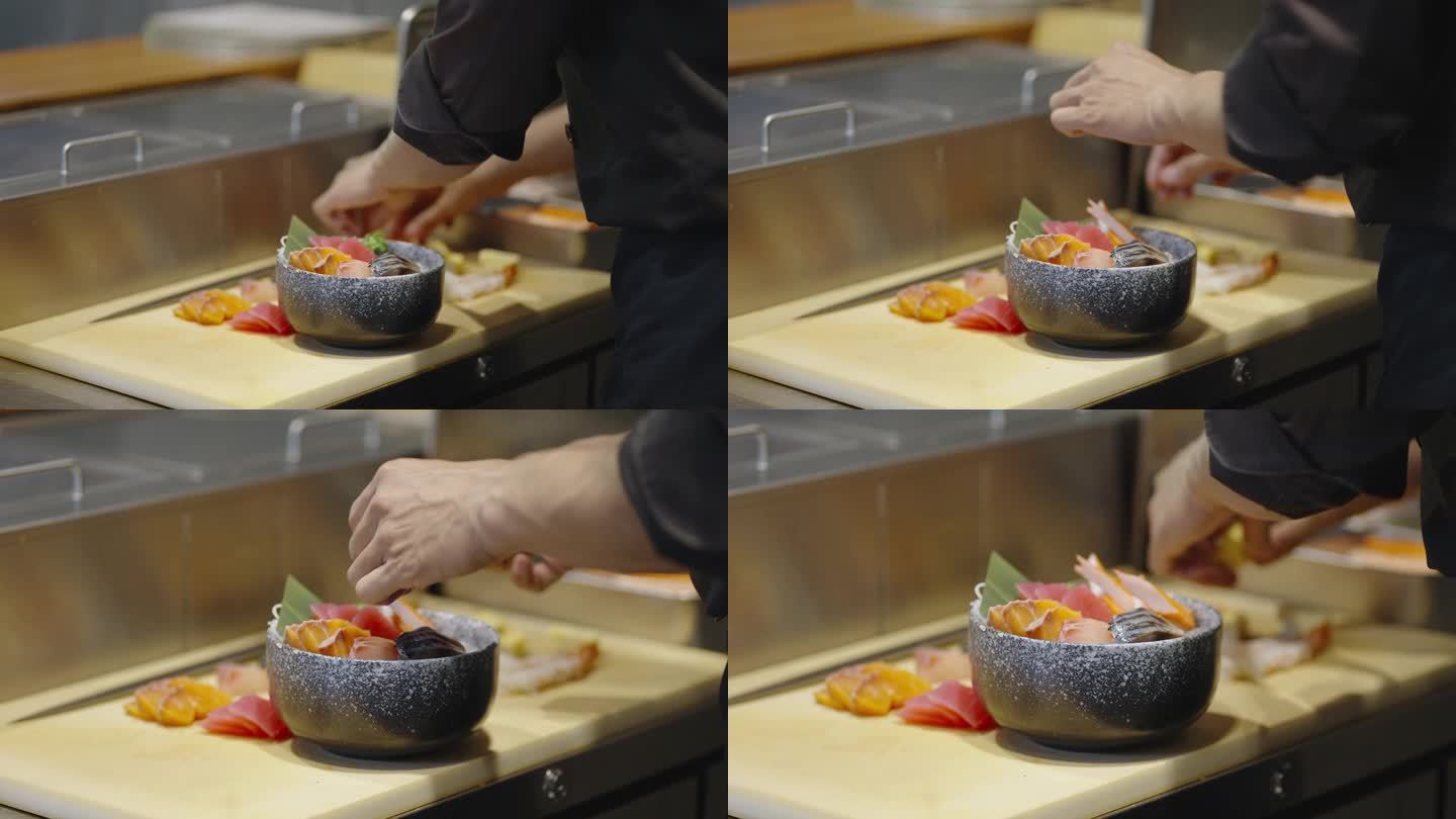 在居酒屋餐厅，寿司师傅将切成薄片的生鱼和海鲜放在醋饭上，准备做清蒸东武饭，并为客人提供服务。
