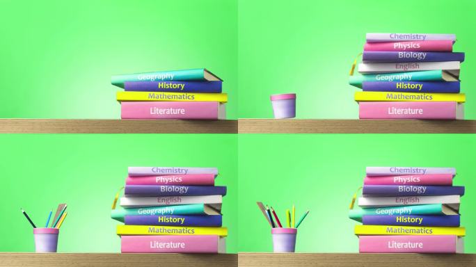 学校的教科书堆积如山。返校概念定格动画视频，教育和阅读概念-木桌上的彩色书籍和铅笔。