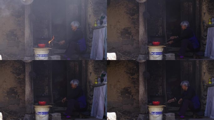 老人烧火做饭