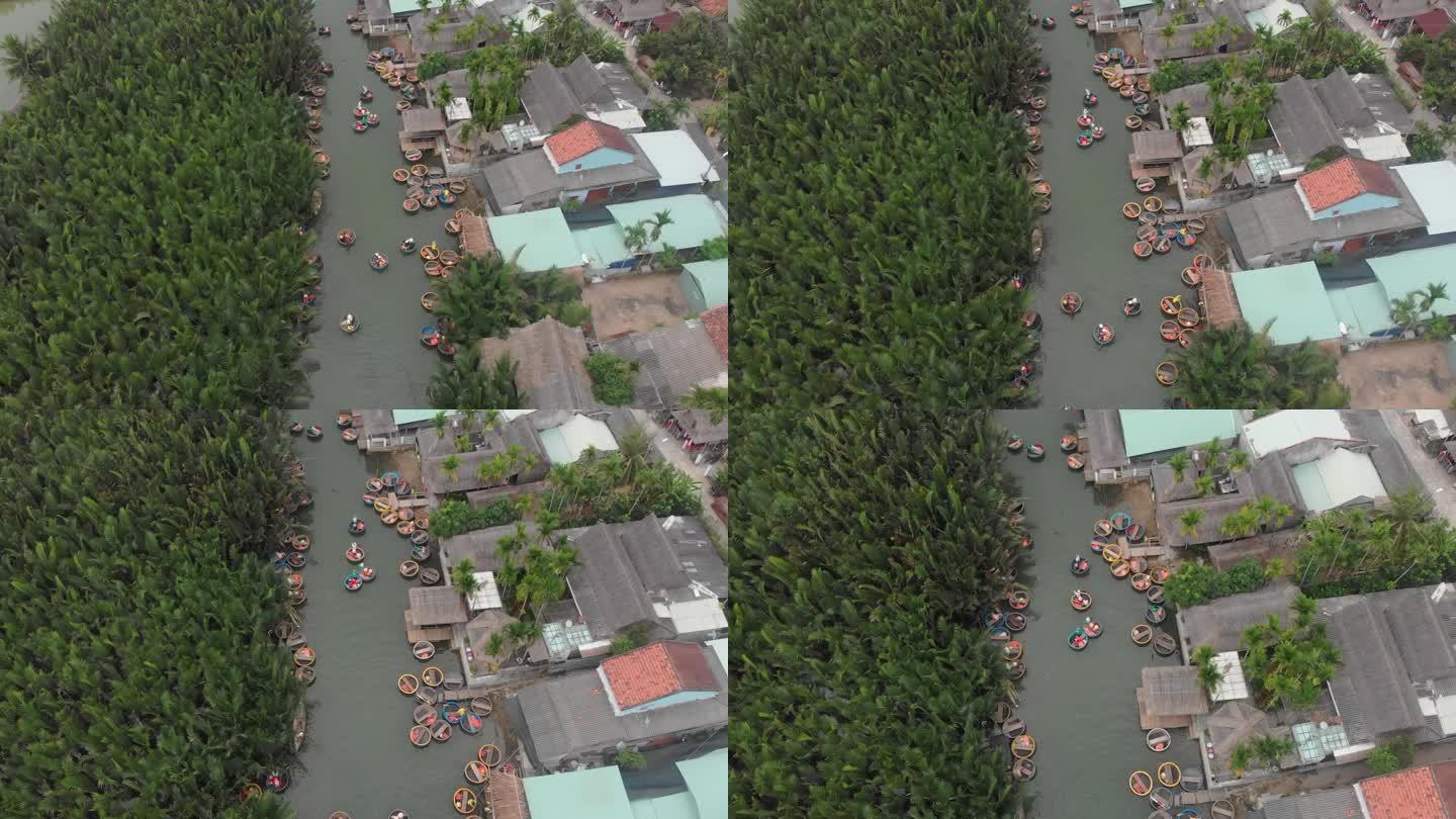 椰村篮船游。棕榈林在金城，越南，Thu Bon河