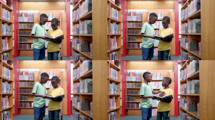 男孩子们在图书馆里站在一起看书