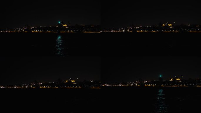 夜间海上灯塔的剪影。闪烁的光。伊斯坦布尔海岸线