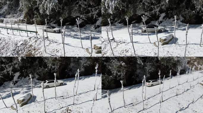 奔驰小轿车在雪地公路行驶旅行航拍雪景雾凇